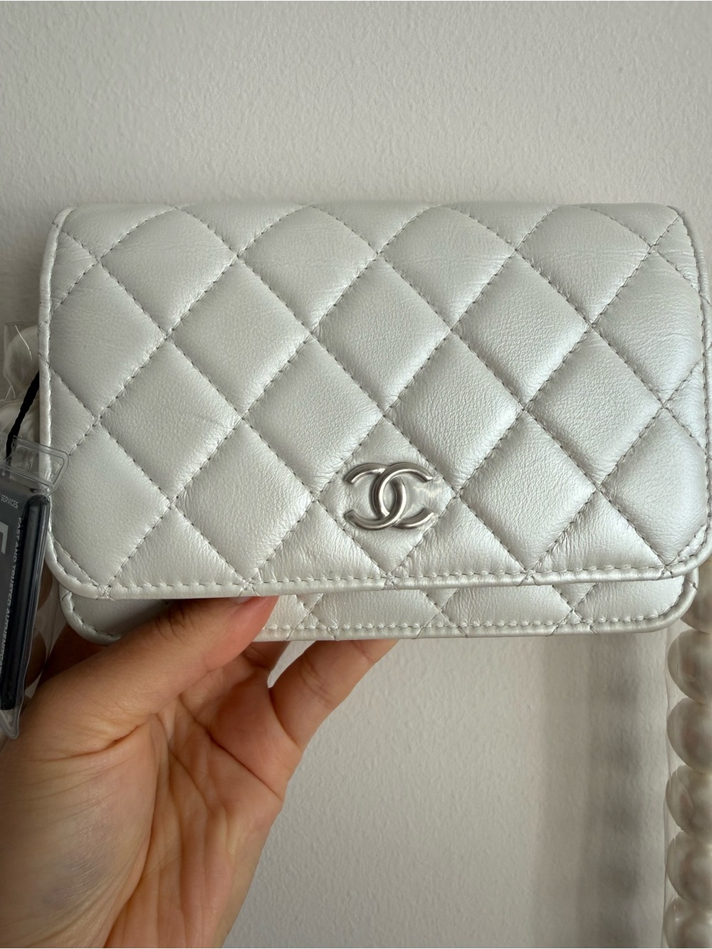 CHANEL Quilted Wallet-on-Chain in White with Silver Hardware